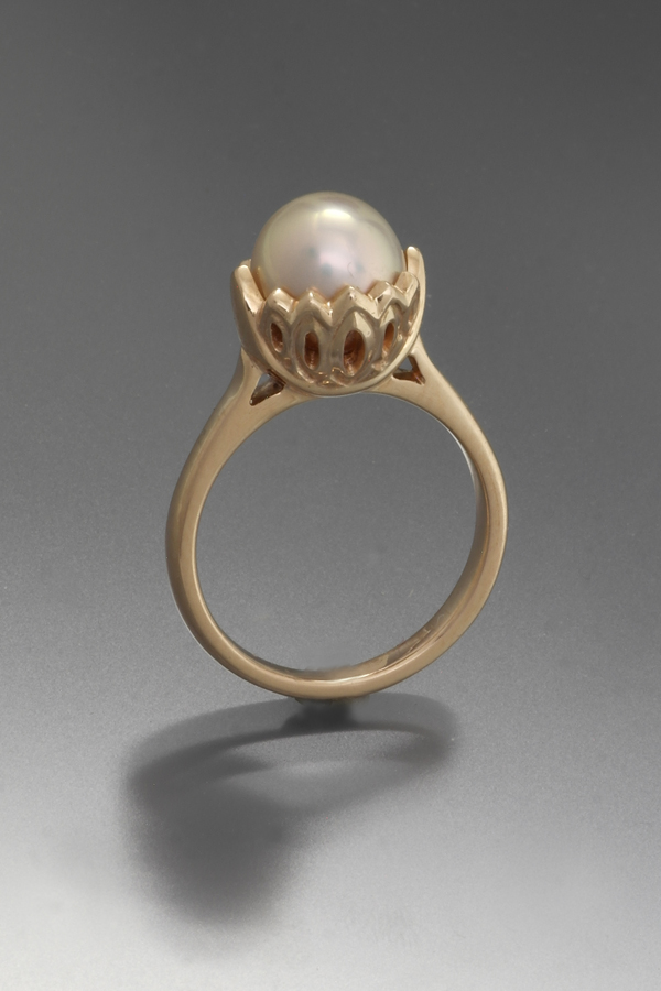 14k rose gold ring with pearl by Terese Millmann .