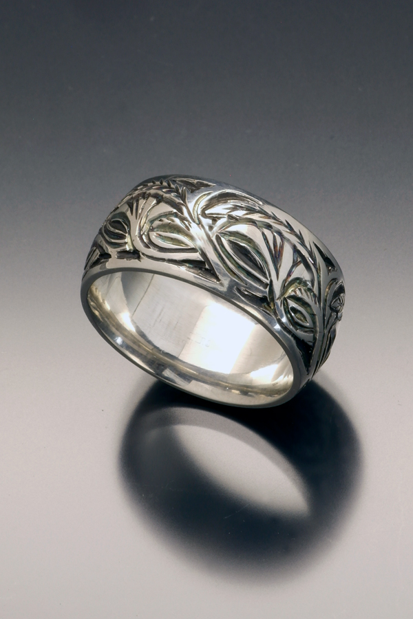 Engraved sterling wedding ring with botanical pattern by Christopher Stephens
