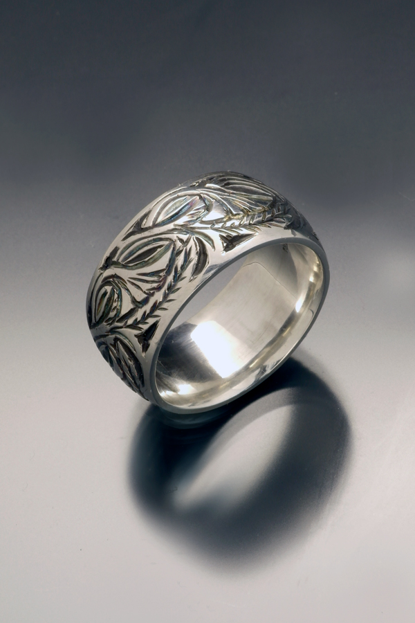 Engraved sterling wedding ring with botanical pattern by Christopher Stephens