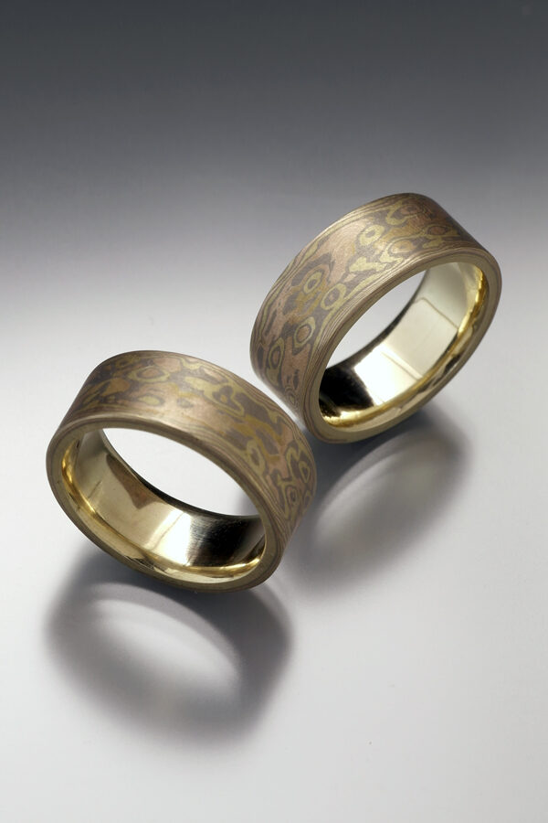 Mokume gane ring band set in in 14k yellow gold; 14k palladium white gold & 14k rose gold. by Christoher Stephens