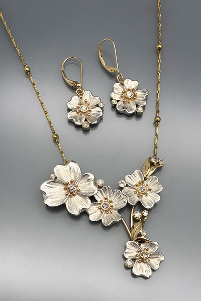 Dog-wood flower motif earring & necklace by Terese Millmann